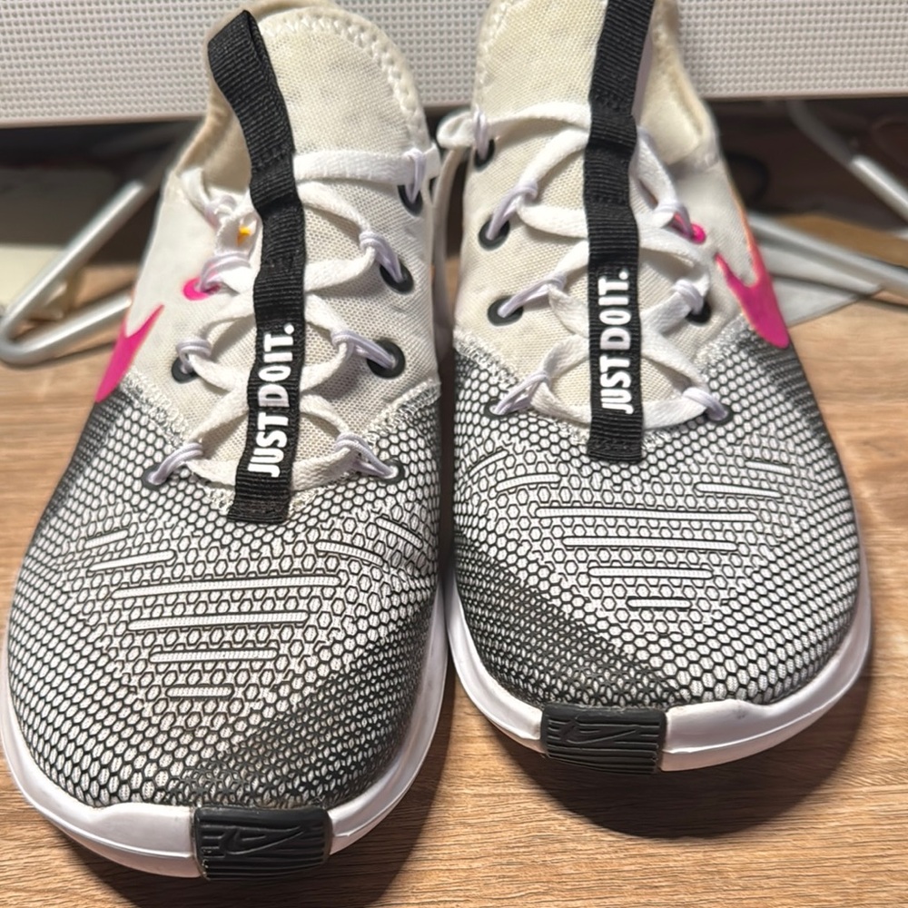 Nike White and Black Athletic Shoes with Sleek Design